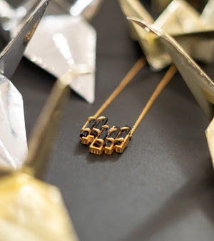 Gold Necklace by UNCUT Jewelry