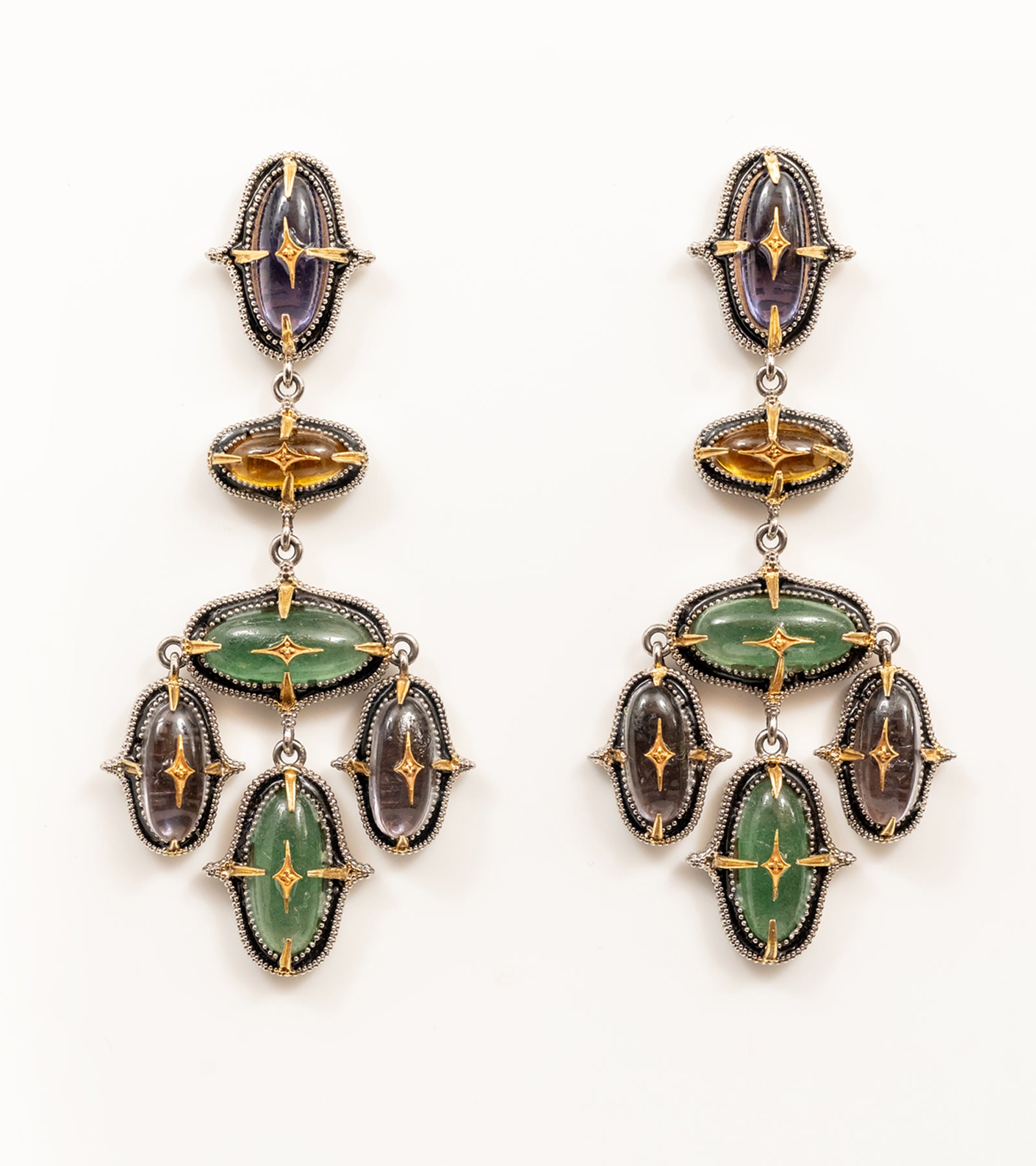 Aarya Earrings with layers of crafted amethyst, topaz, and aventurine in silver milgrain settings with gold star motifs