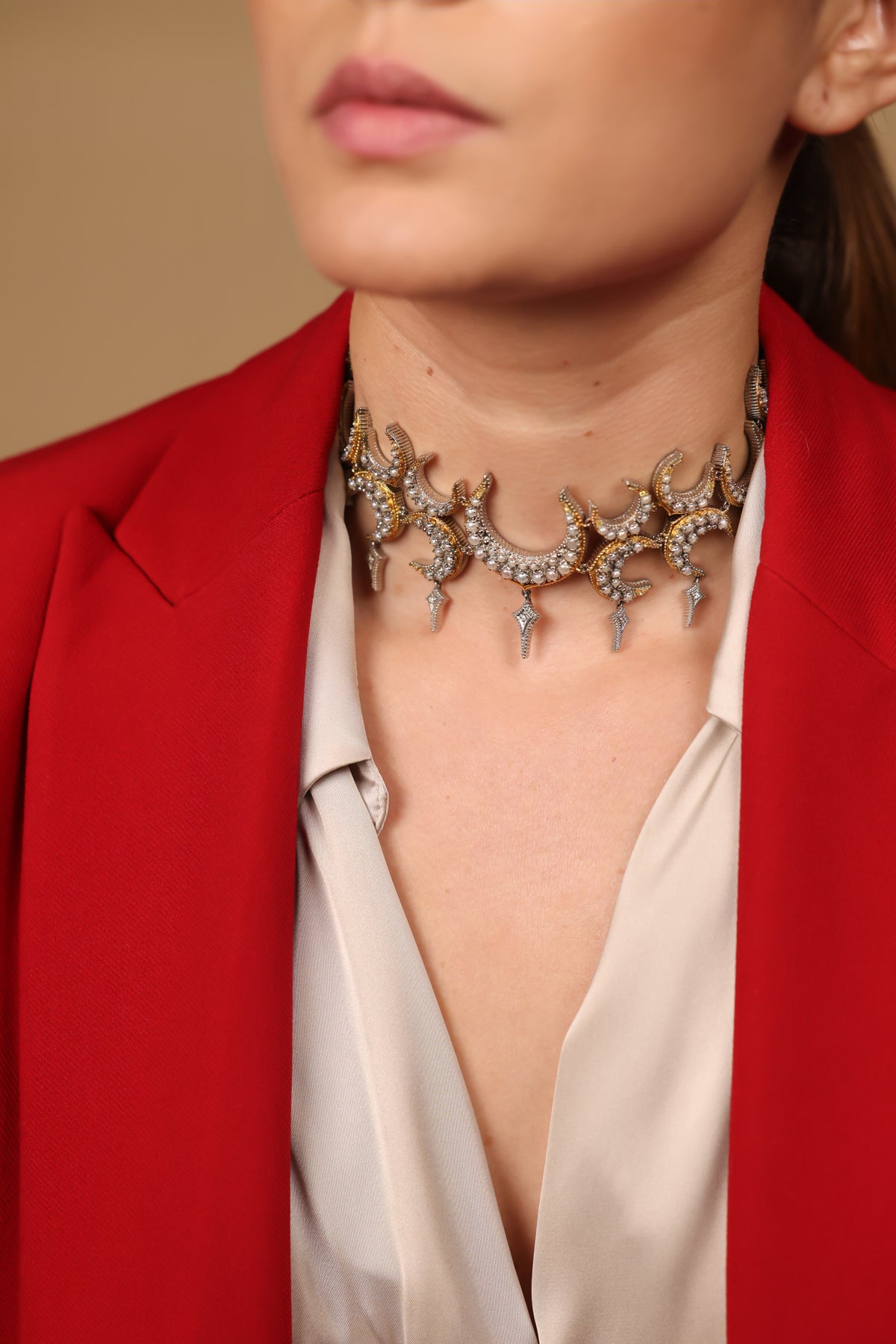 Close-up of the diamond and black enamel detailing on the Icra Choker
