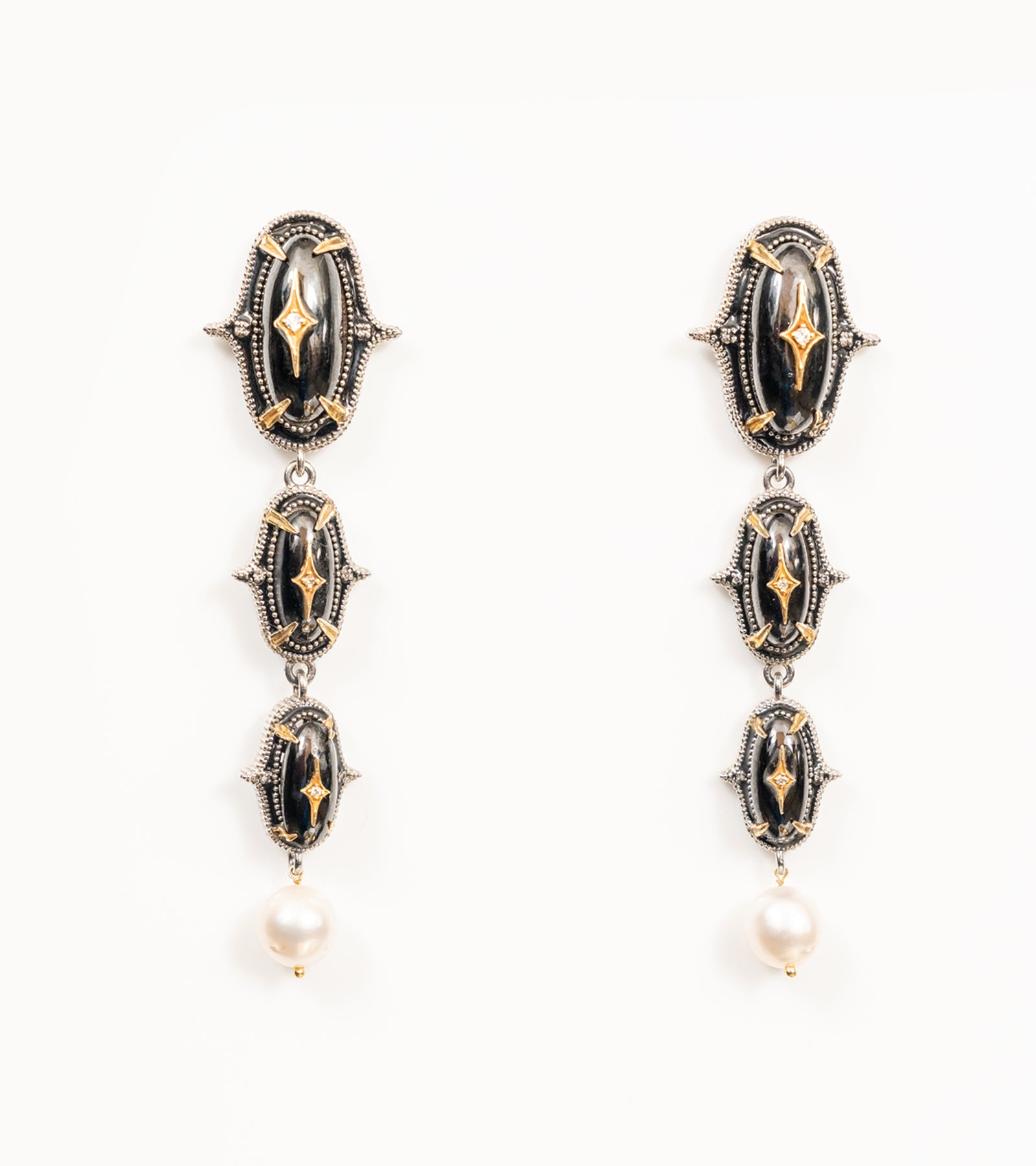 Jaipur Danglers in silver with 18K gold accents, hand-painted black enamel, black onyx, and China pearl drops