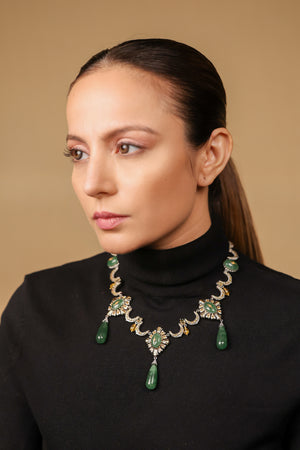 Neelima Necklace worn with hair swept back, showing the gold and diamond work