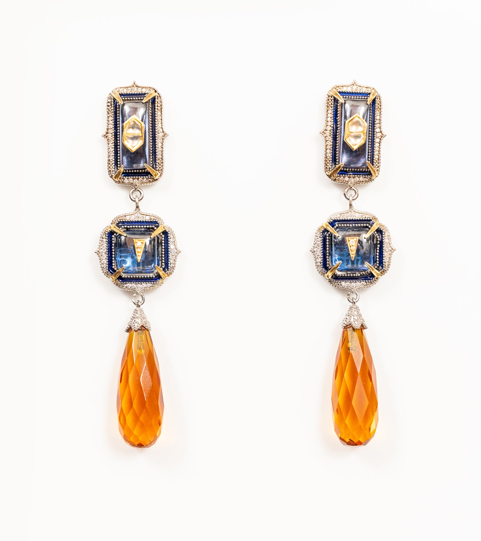 Rumi Earrings with sculptural danglers in deep blue kyanite and yellow topaz crystal drops, set with Polki diamonds and gold accents