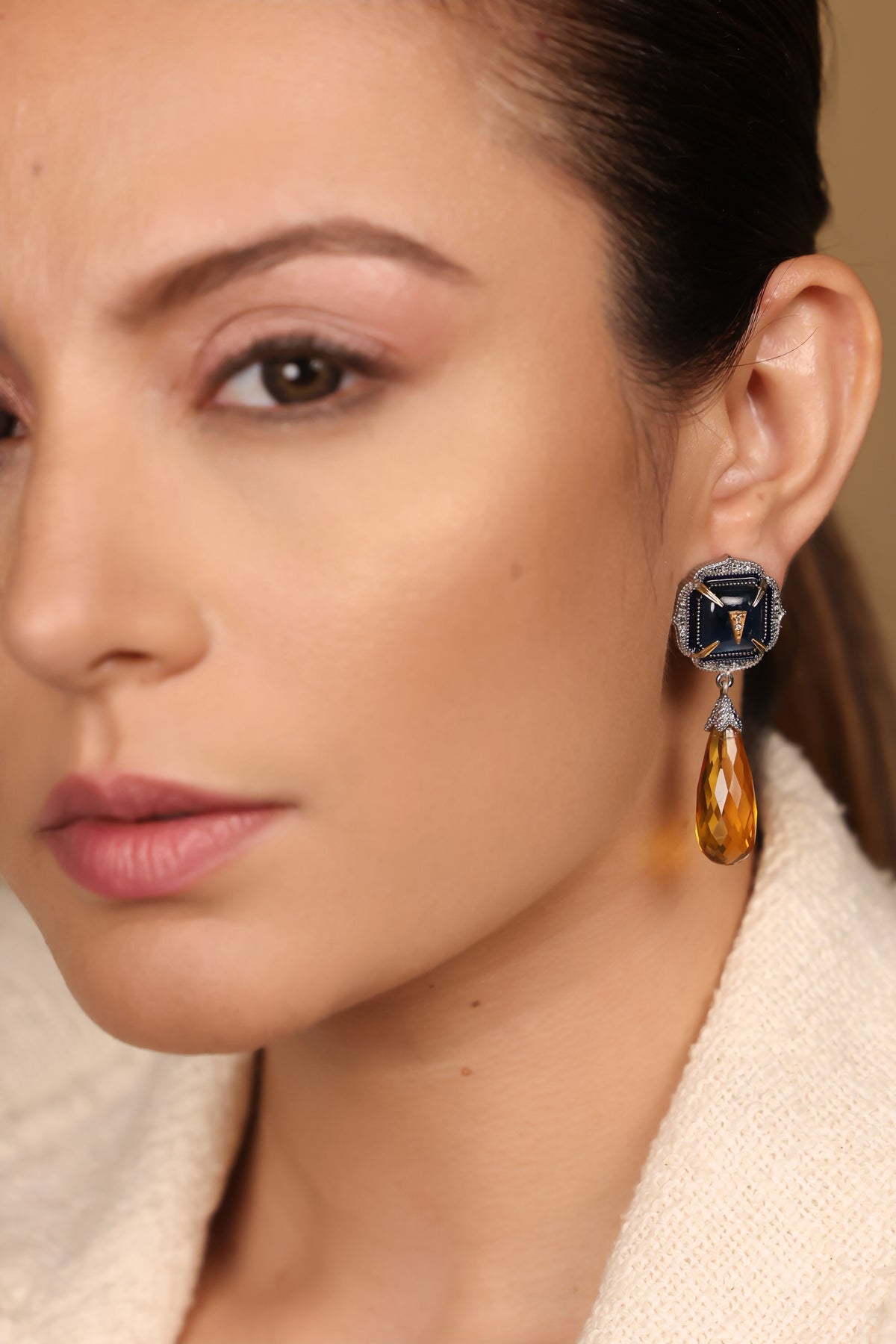 Close-up of the kyanite crystal and diamond detailing on the Rumi Petit Earrings