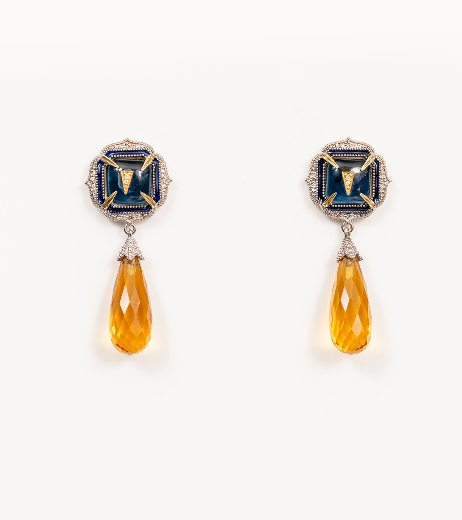 Rumi Petit Earrings with deep blue kyanite crystals, natural diamonds, sterling silver, and 18K gold accents, finished with a faceted topaz drop