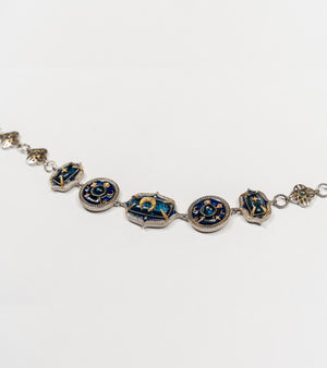 Taskan Choker in silver with 18K and 22K gold, kyanite, Polki diamonds, and hand-painted blue enamel