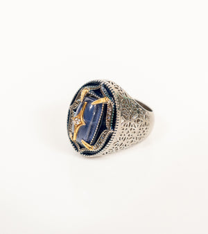 kyanite-front.jpg Taskan Ring in blue kyanite with hand-painted enamel, natural diamonds, sterling silver, and 18K gold in an architectural silhouette