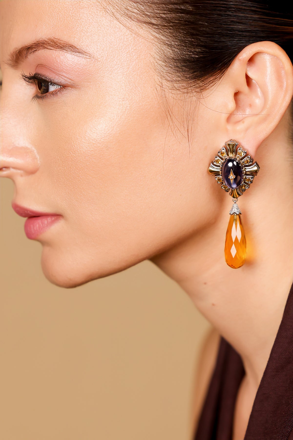 Close-up of the blue hand-painted enamel work on the Virja Earrings