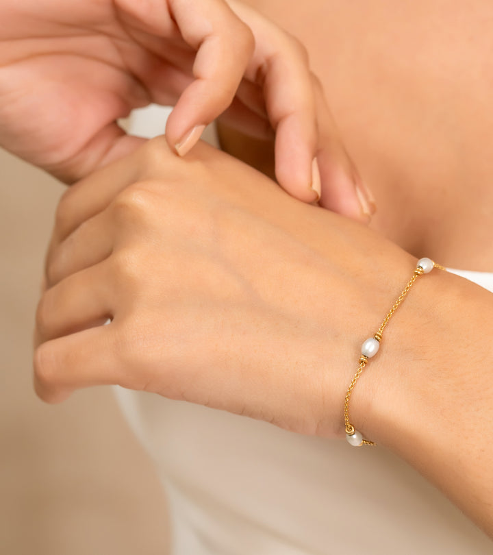 Pearl and Gold Bracelets by UNCUT Jewelry