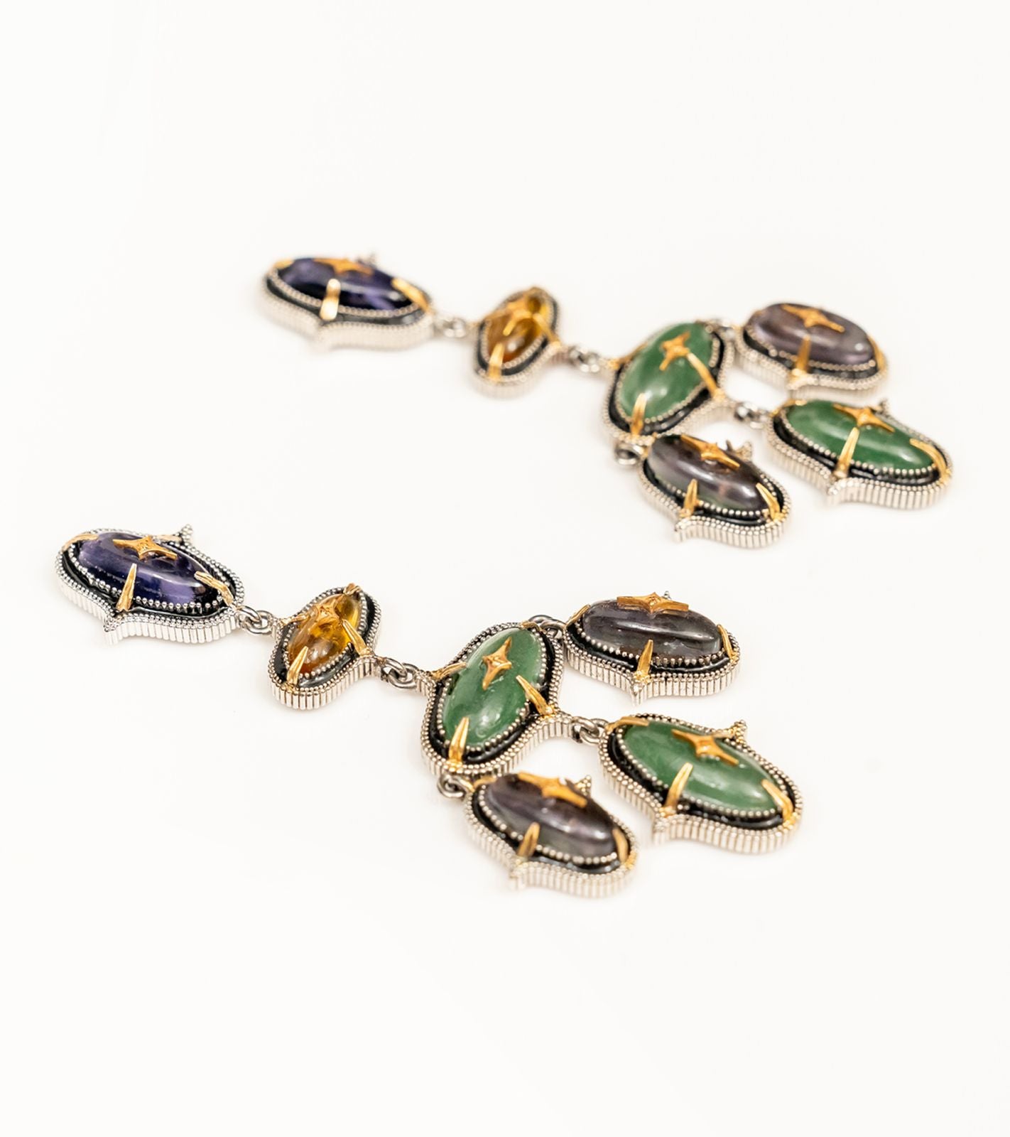 Detail of the layered amethyst, topaz, and aventurine stones on the Aarya Earrings