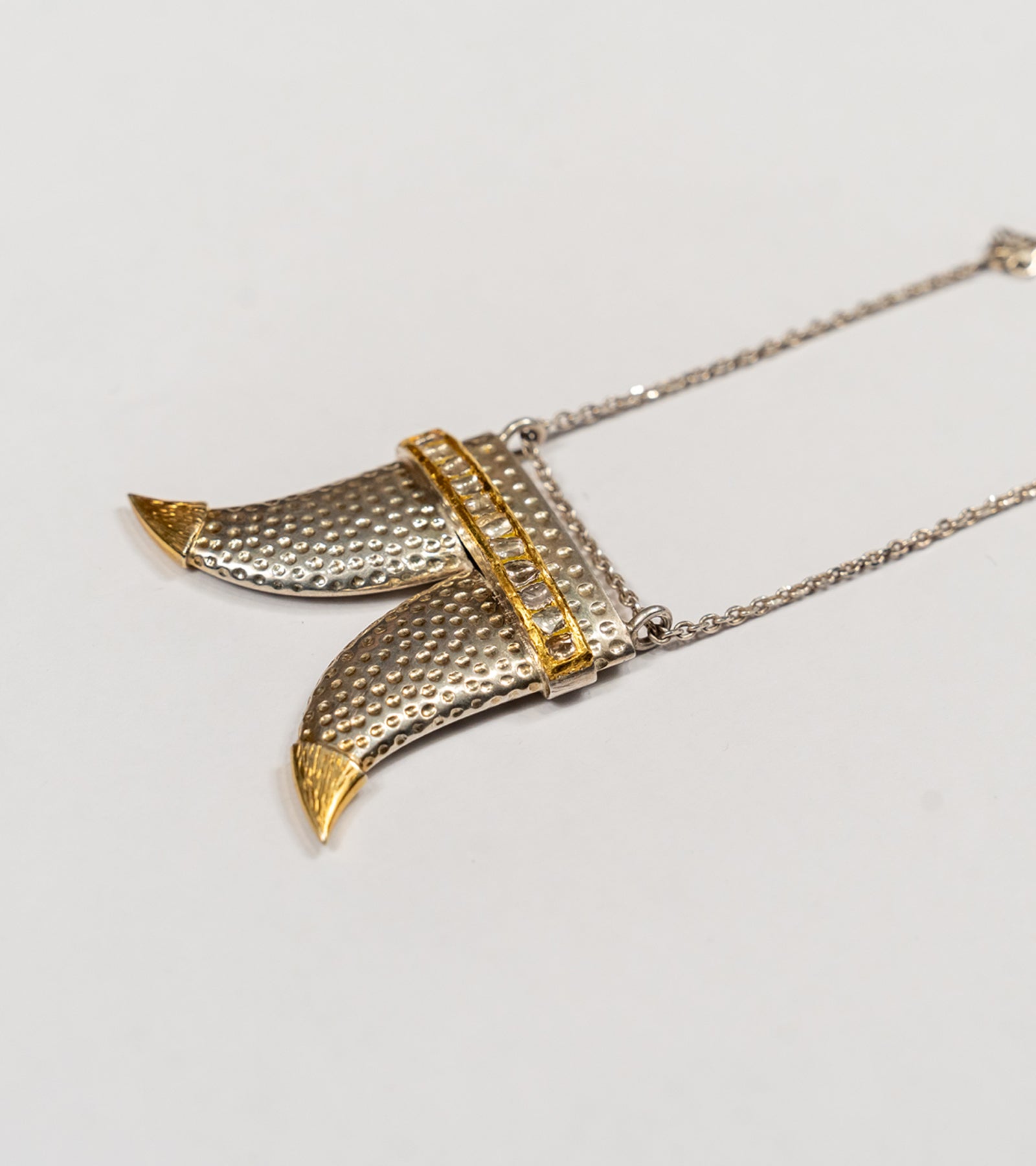 The Ace Necklace, an Ace-emblem pendant in 22K Kundan gold with Polki diamonds