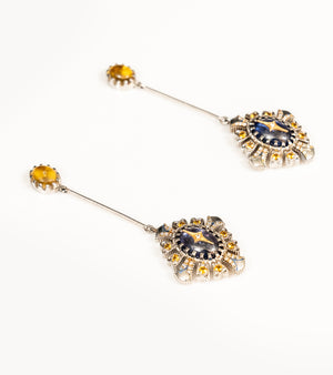 Detail of the blue hand-painted enamel finish on the Ada Earrings