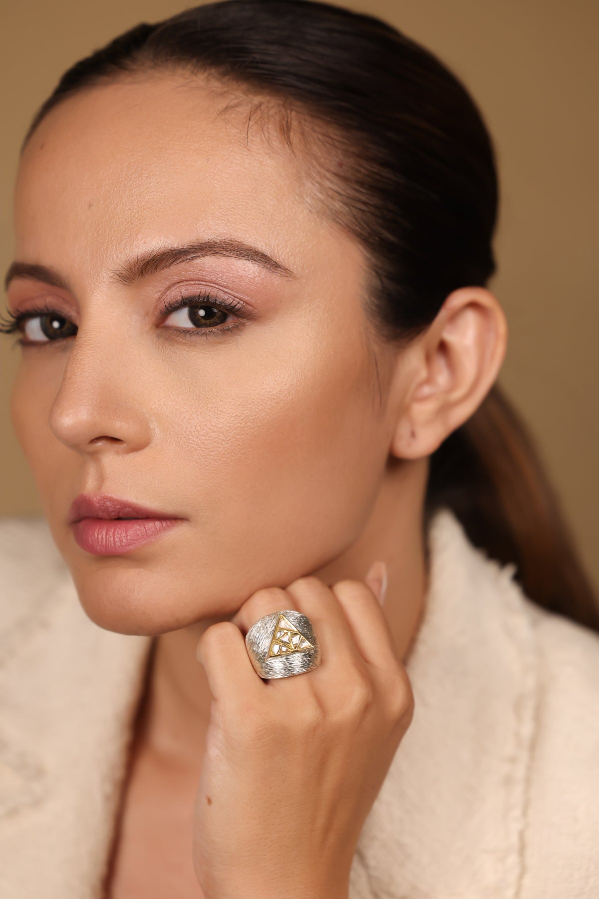 Ann Cocktail Ring paired with delicate Polki studs for an elevated layered look