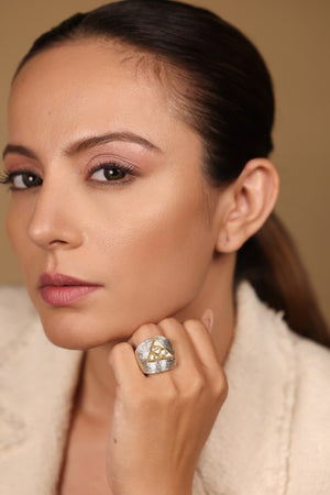 Ann Cocktail Ring paired with delicate Polki studs for an elevated layered look