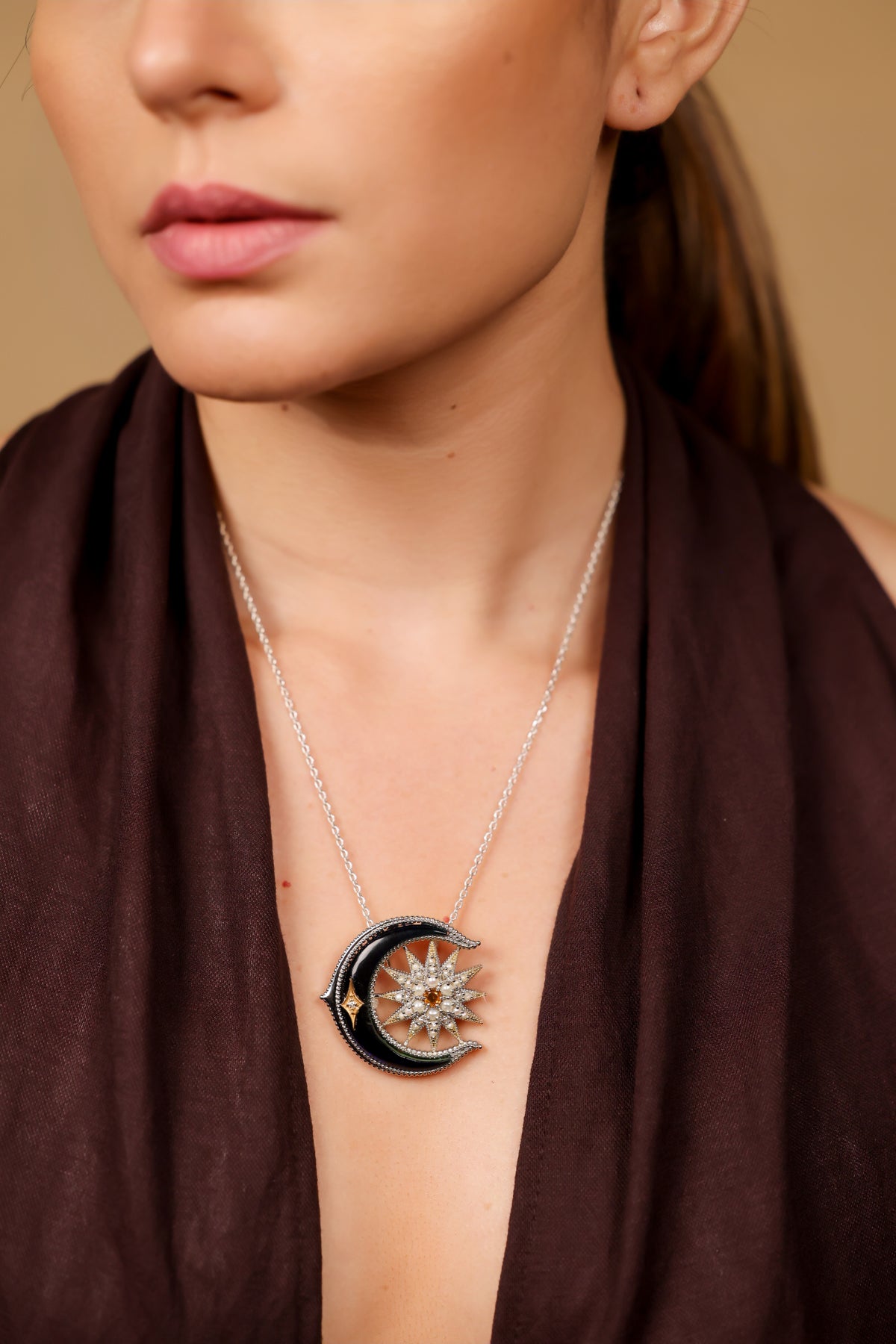 Close-up of the kyanite and citrine stones on the Arkendu Necklace, set alongside pearls in sterling silver
