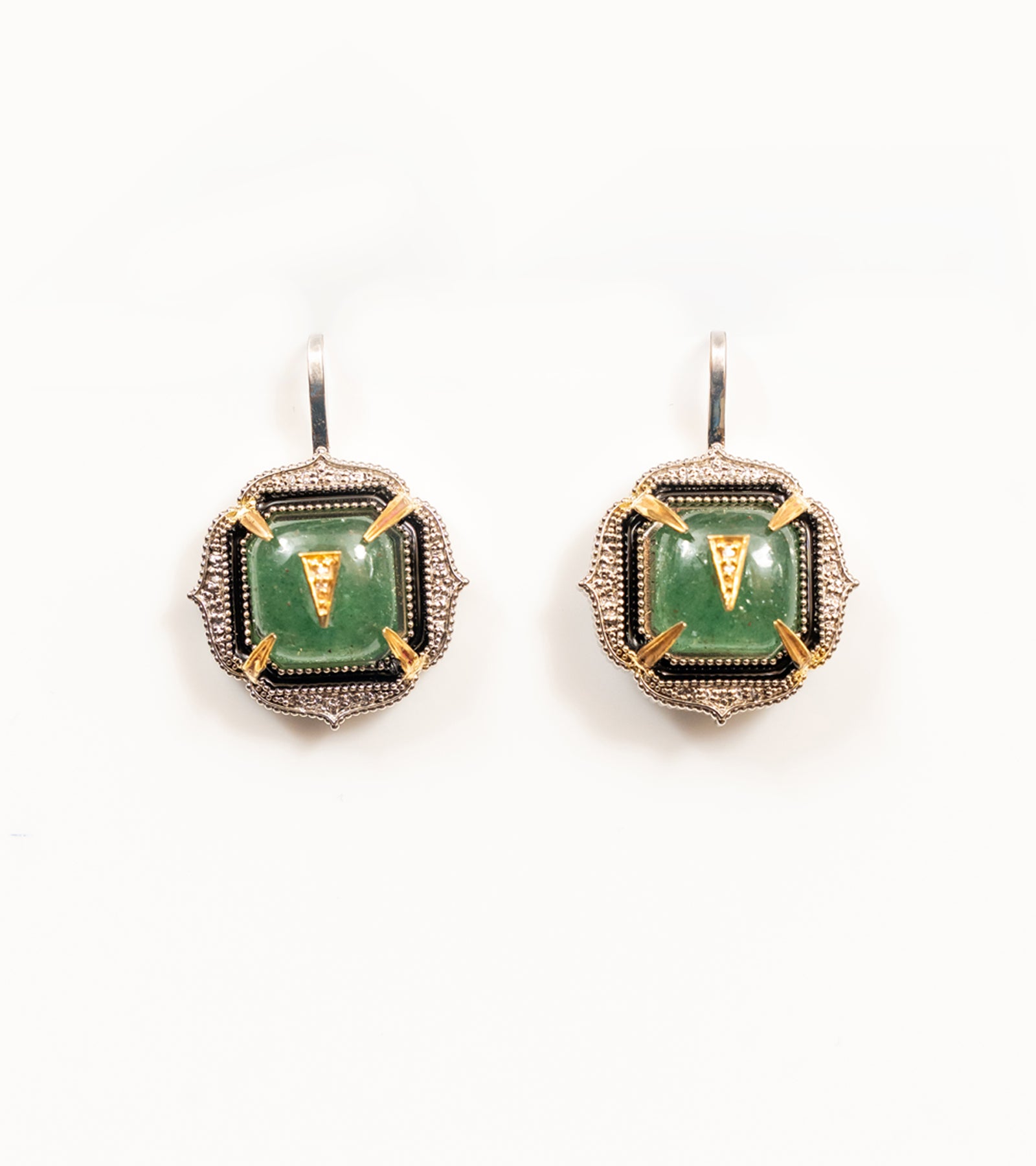 Close-up of Aurora Earrings highlighting the crafted kyanite crystal and natural diamond accents