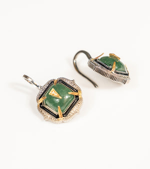 Detail shot of Aurora Earrings capturing the layered texture of the enamel and gemstone craftsmanship