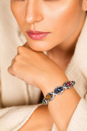 Close-up of the Bombay Stack Classic cuff highlighting the cabochon kyanite, tourmaline, and citrine stones set in sterling silver