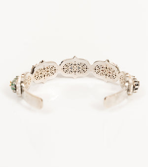 Bombay Stack Classic cuff worn on the wrist as the centre piece of a stacked bracelet look