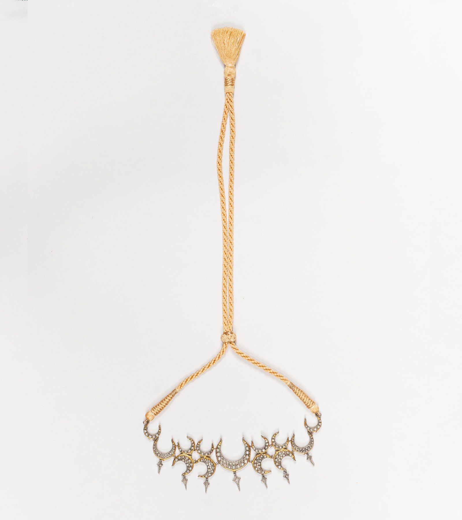 Side profile of the Icra Choker showing its structured silhouette and enamel-detailed silver work
