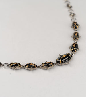 Jaipur Necklace in silver with 18K gold accents, black onyx stones, and hand-painted black enamel