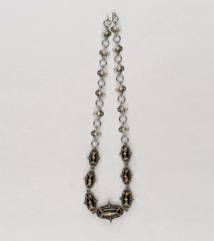 Detail of the hand-painted black enamel and clean silver lines on the Jaipur Necklace