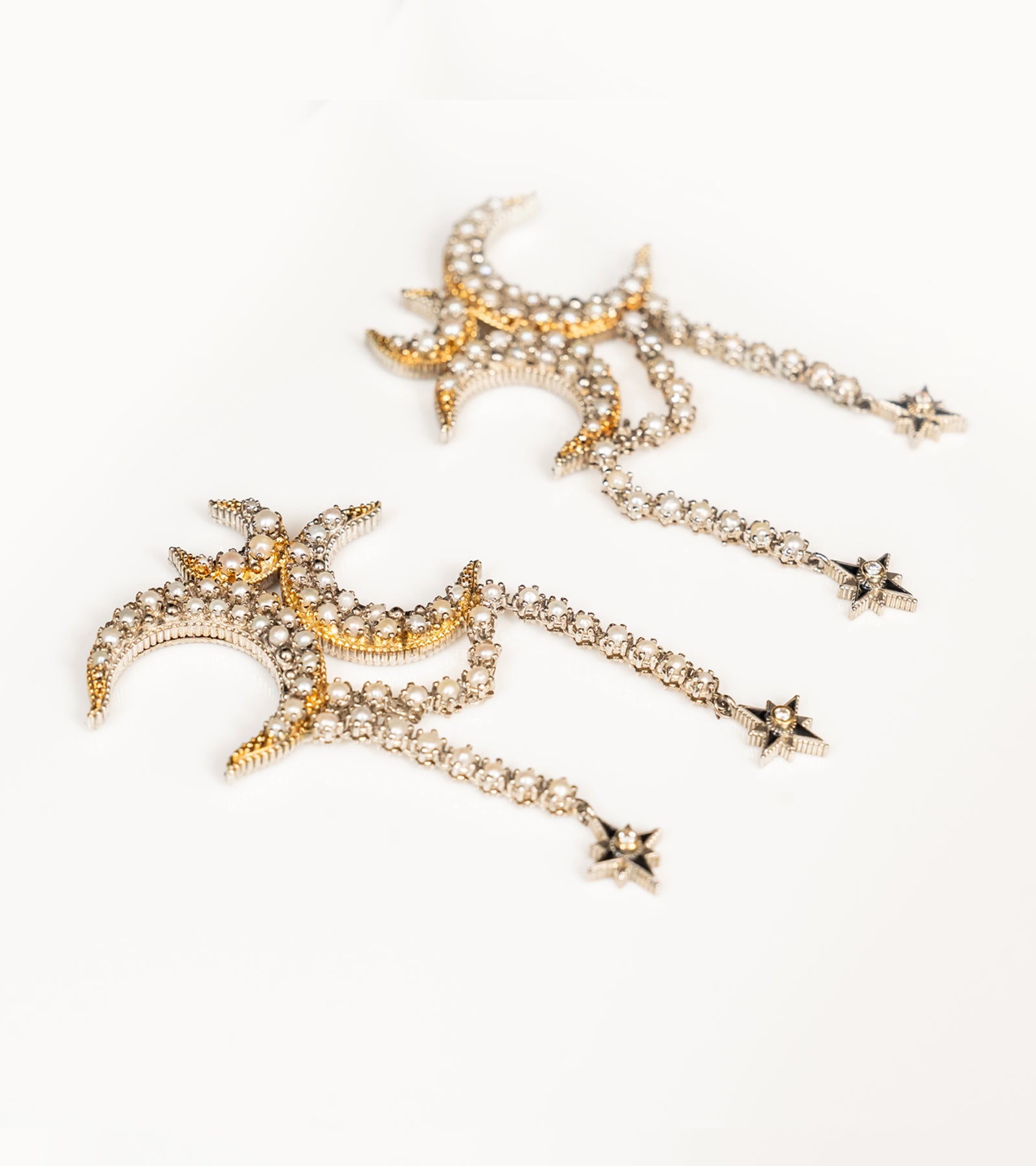 Detail of the delicate Japanese pearls and star drops on the Kashvi Earrings