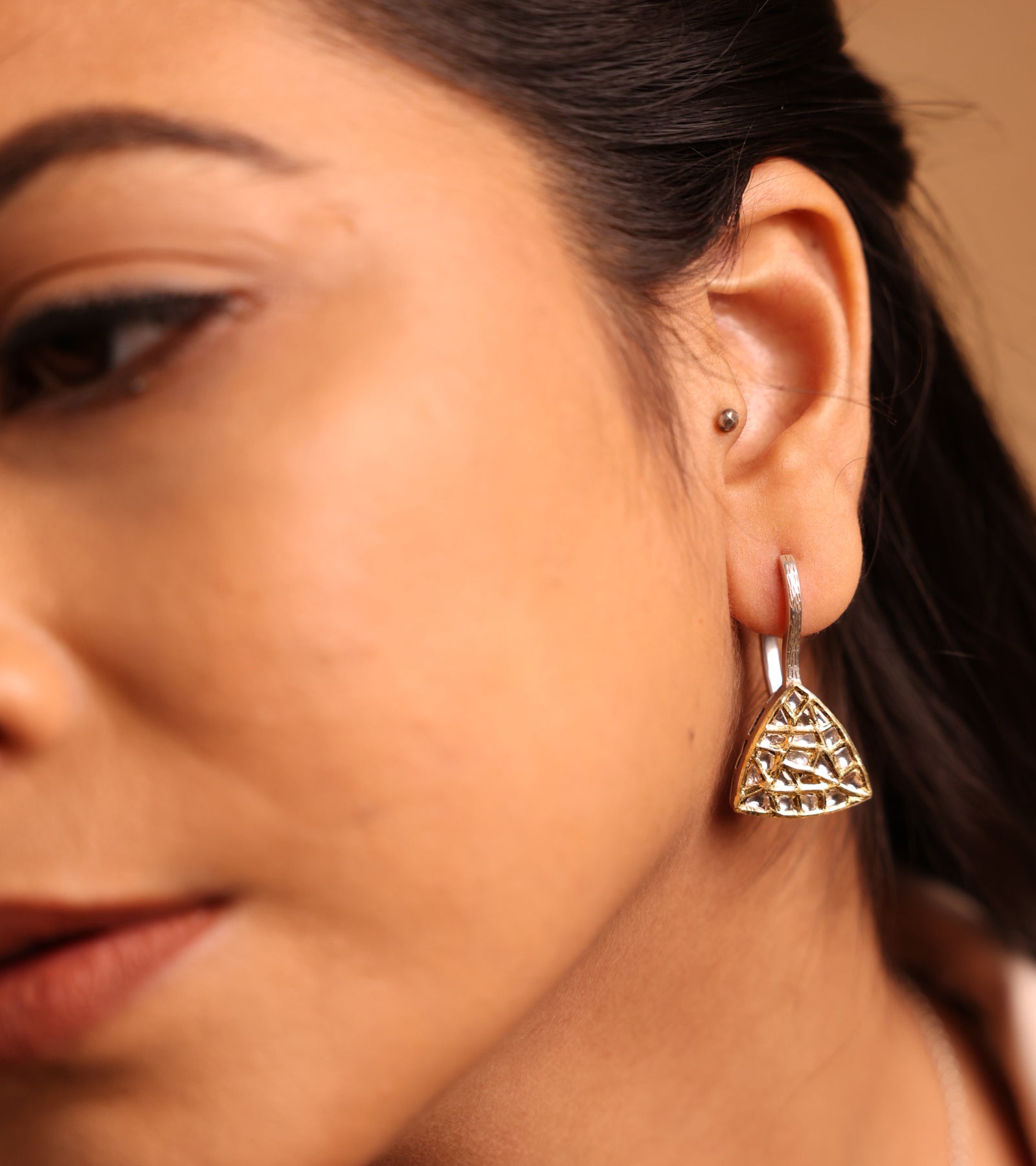 Leo Hoops trillion-shaped earrings with natural Polki diamonds set in 22K Kundan gold