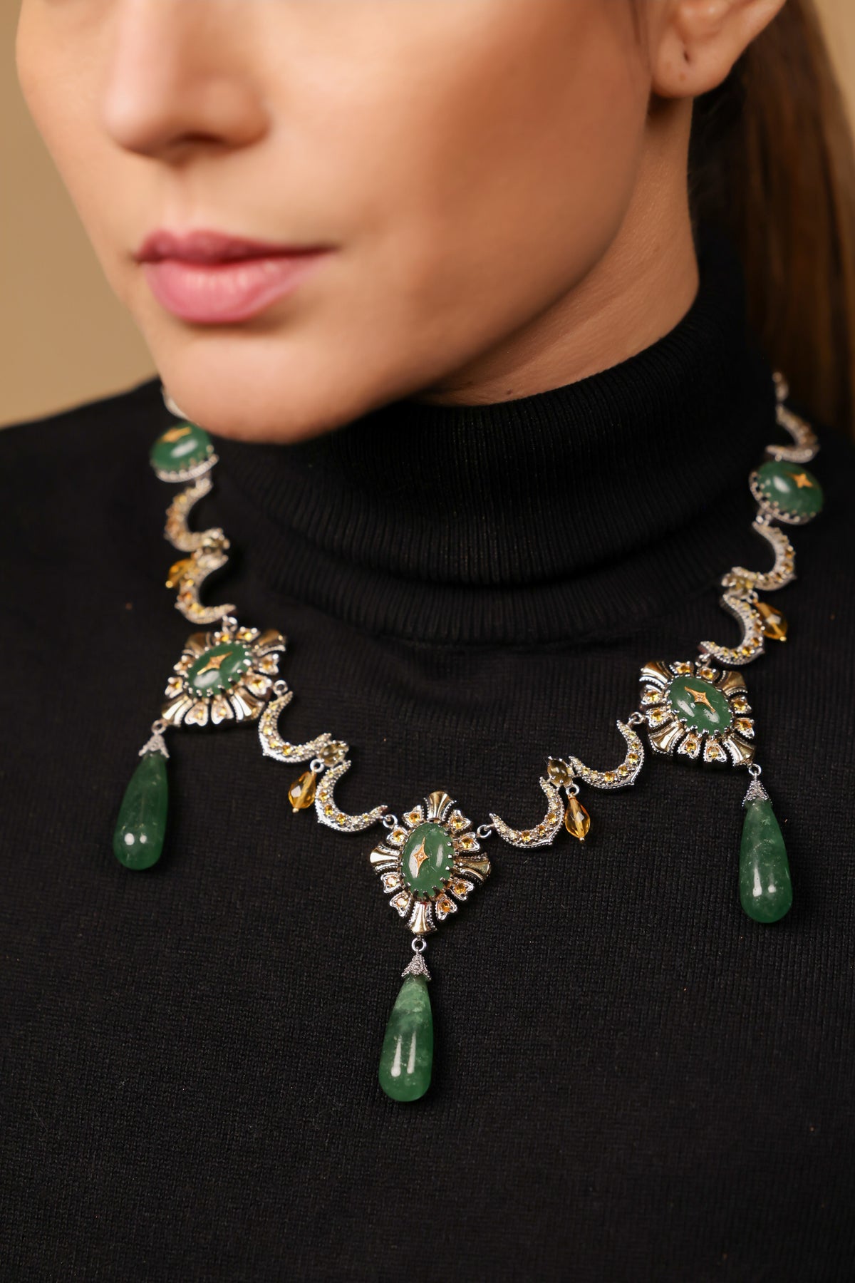 Close-up of the scalloped gold and diamond work on the Neelima Necklace