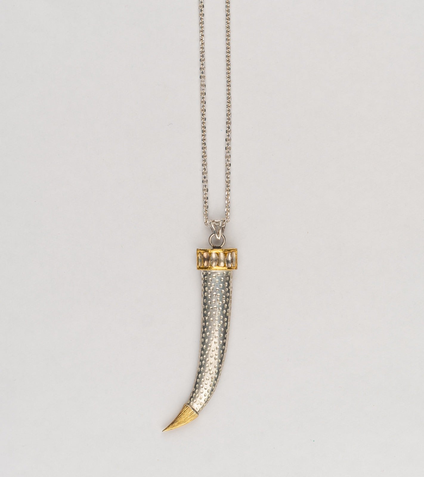 Neo Necklace by UBAA featuring a dagger motif pendant in 22K Kundan gold with Polki diamonds
