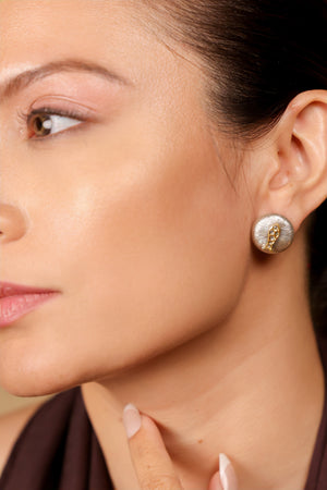 Close-up of the sculptural texture and Polki diamond detailing on the Nox Earrings