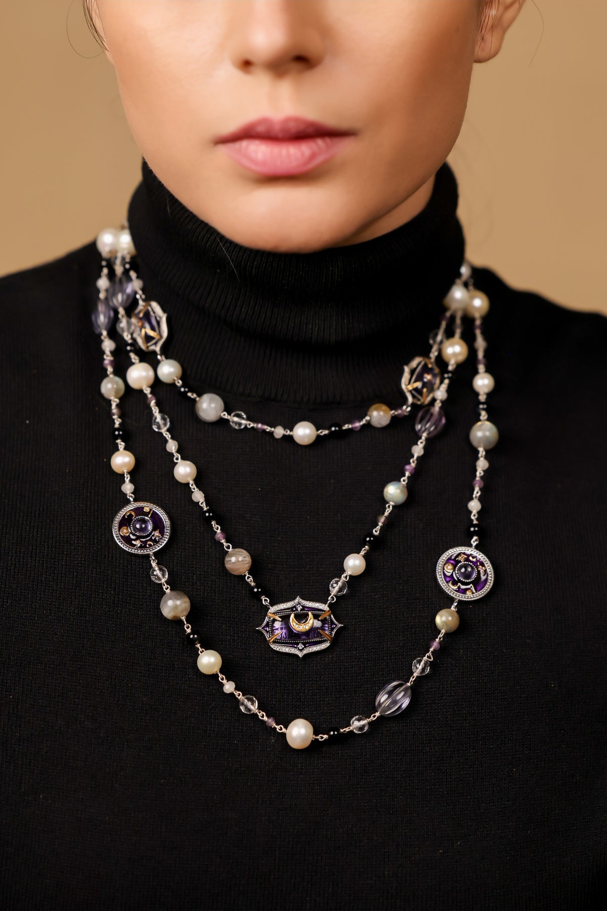 Prive Necklace worn with a deep neckline, the layers framing the collarbone