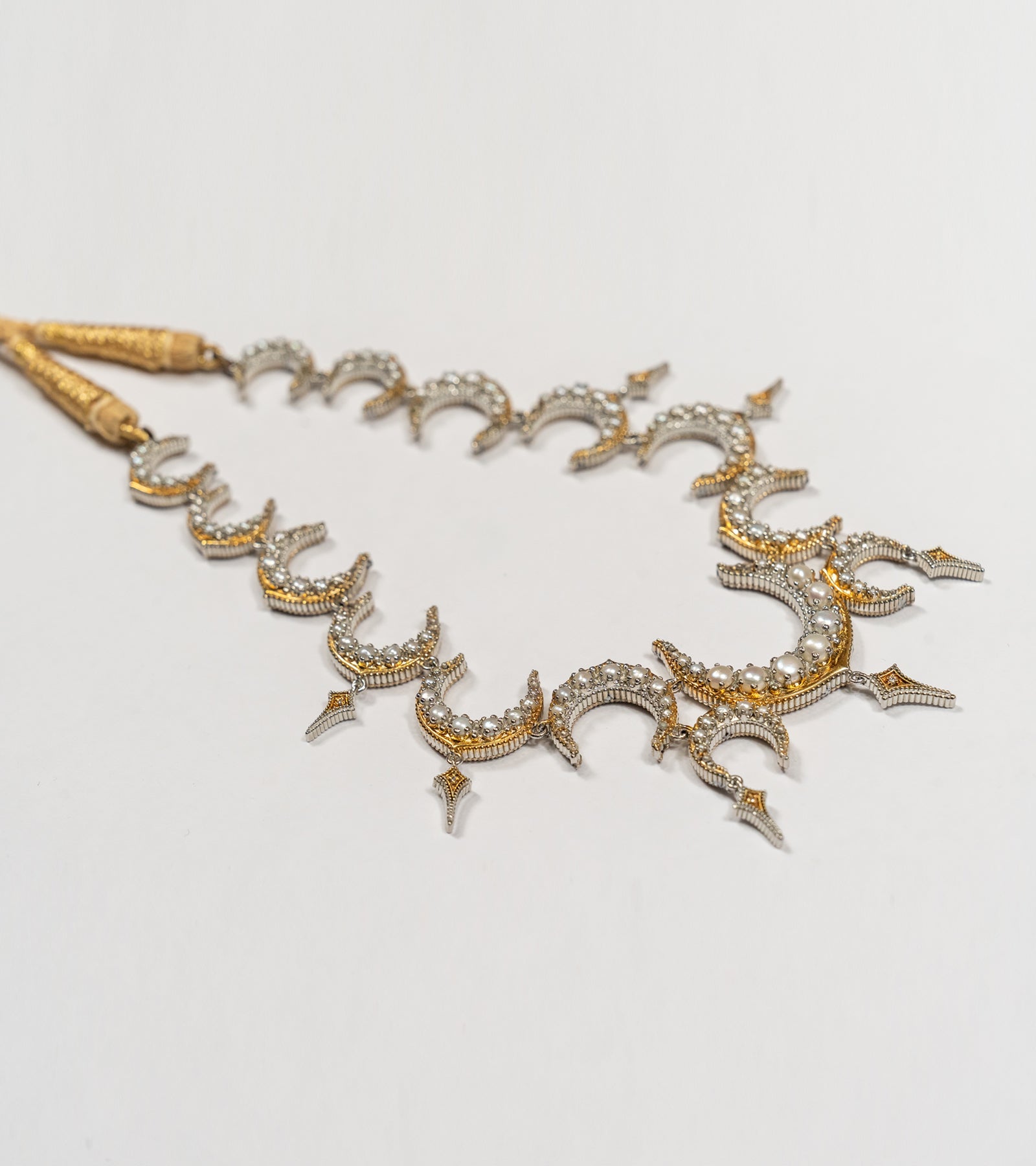 Ragini Necklace with a crescent motif in black hand-painted enamel, diamonds, and soft China pearls in sterling silver