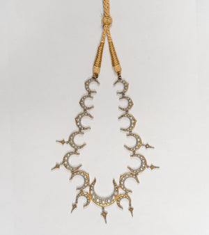 Detail of the delicate China pearls and diamond accents on the Ragini Necklace