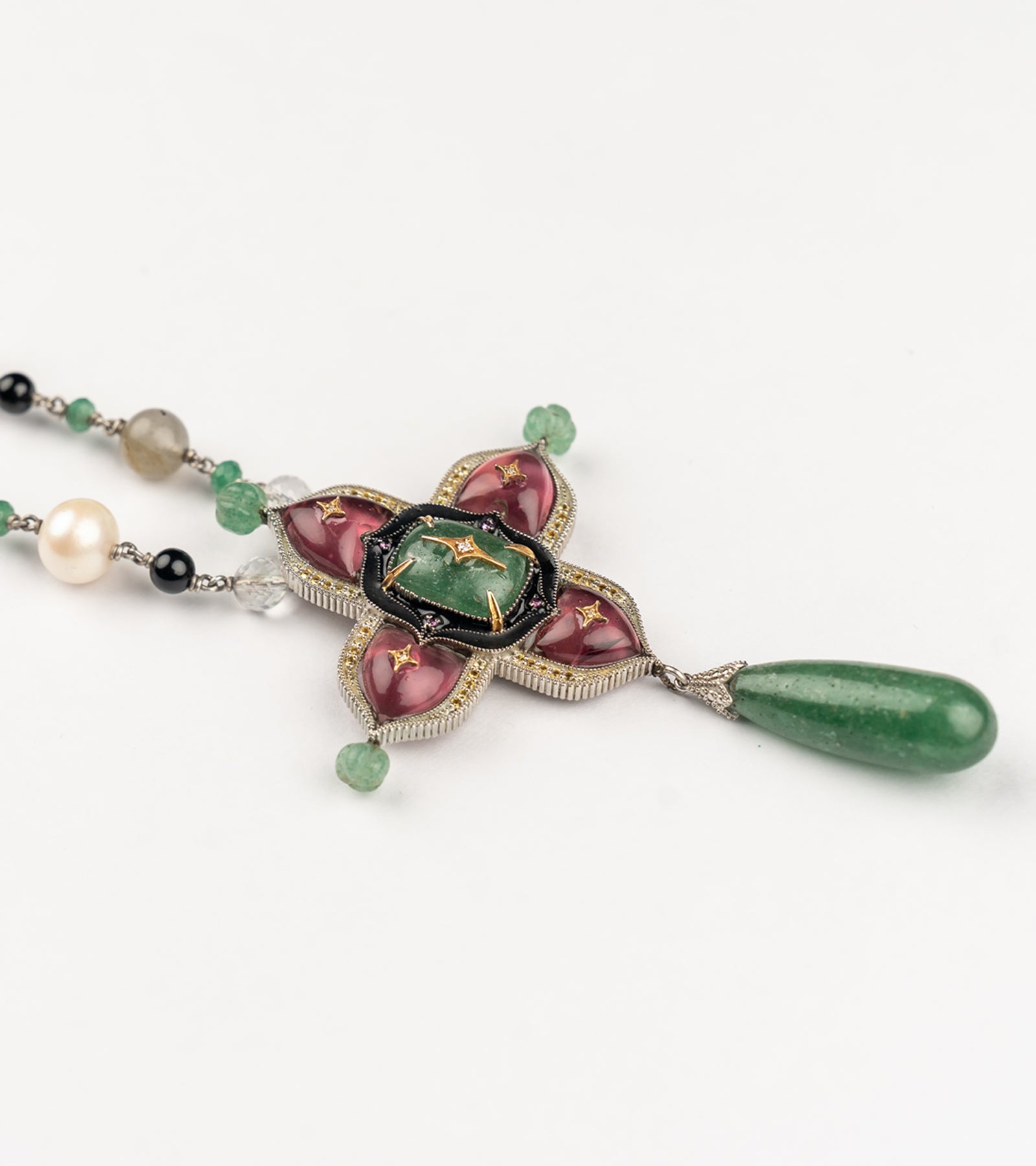 Rangoon Necklace with a Gunthan style mala of South Sea pearls, Japanese pearls, crystal, and natural stones, anchored by a hand-painted black enamel pendant