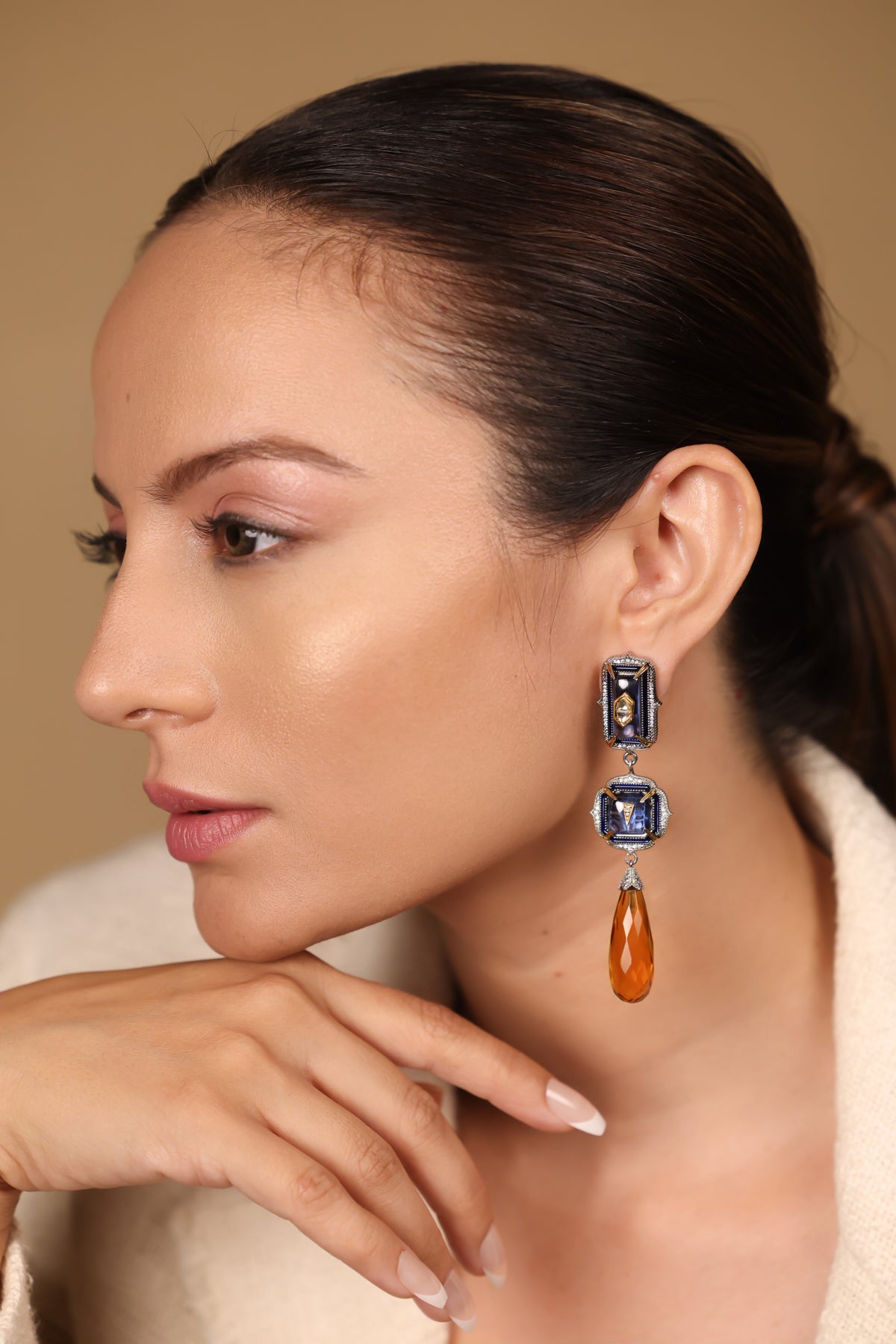 Close-up of the deep blue kyanite and Polki diamond detailing on the Rumi Earrings