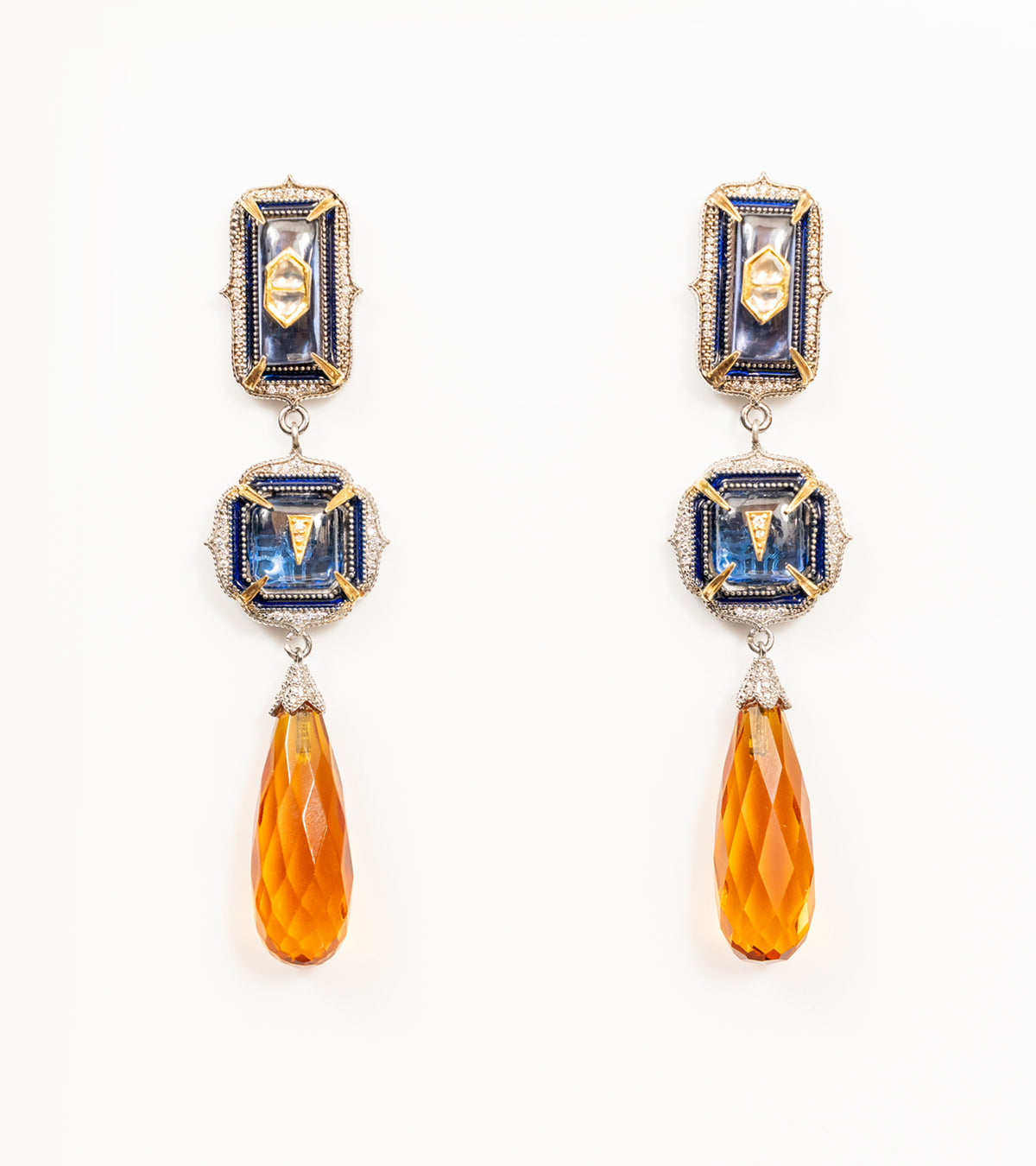 Rumi Earrings with sculptural danglers in deep blue kyanite and yellow topaz crystal drops, set with Polki diamonds and gold accents