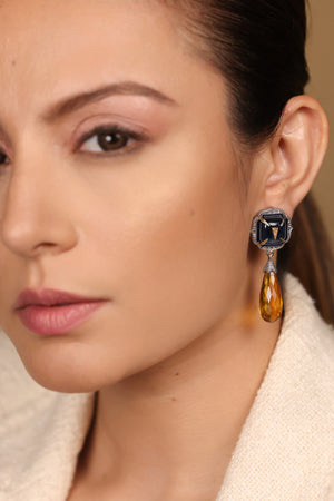 Close-up of the kyanite crystal and diamond detailing on the Rumi Petit Earrings