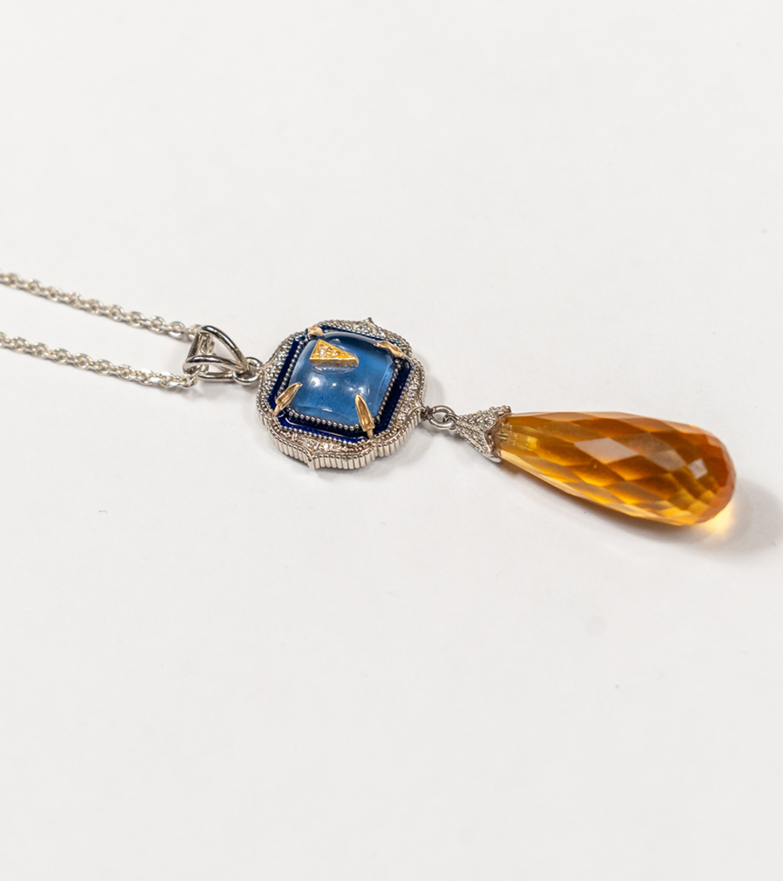 Rumi Petit Pendant with kyanite crystal and faceted topaz drop, 18K gold and diamond details