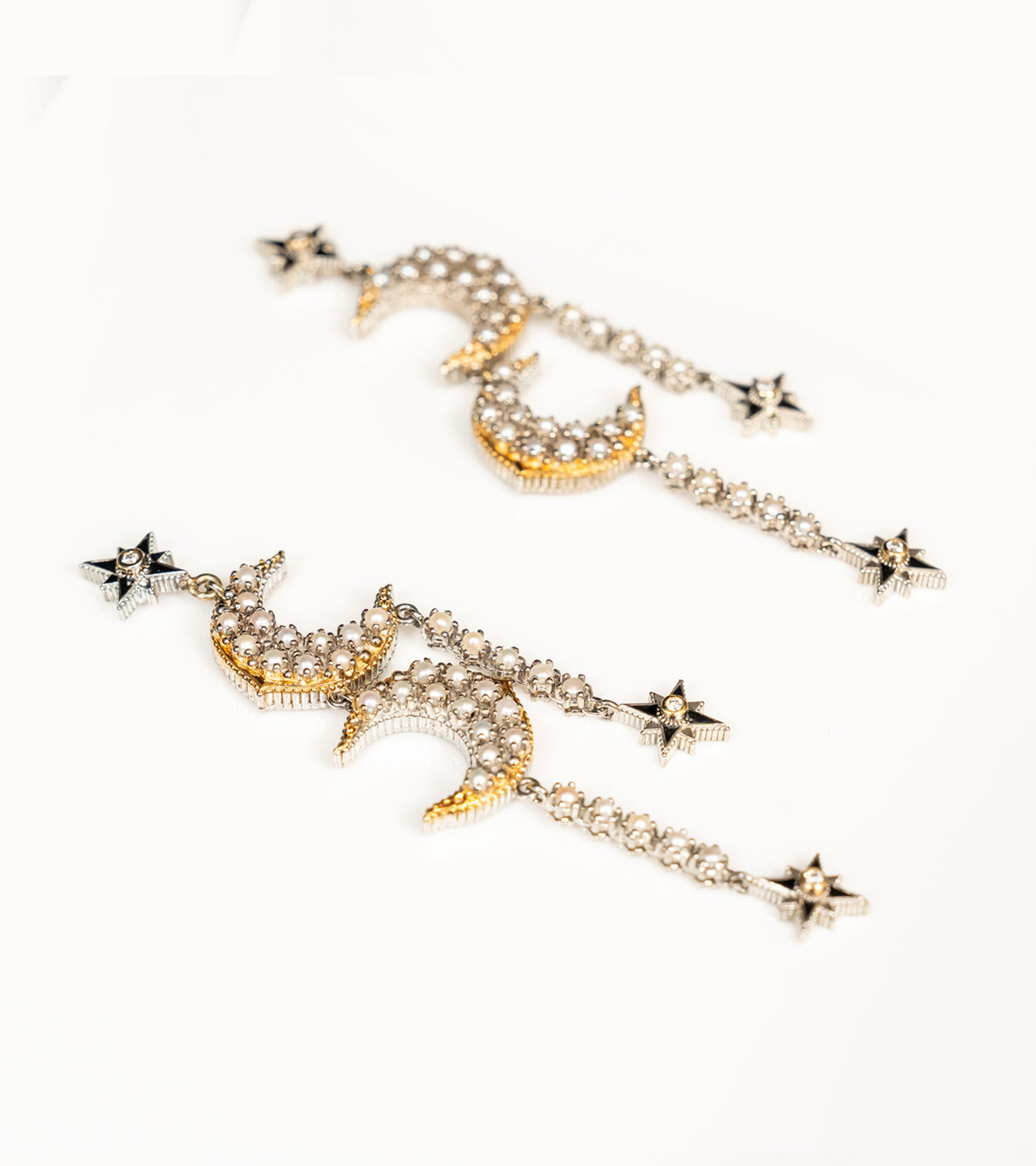 Detail of the delicate Japanese pearls on the Sana Earrings' danglers