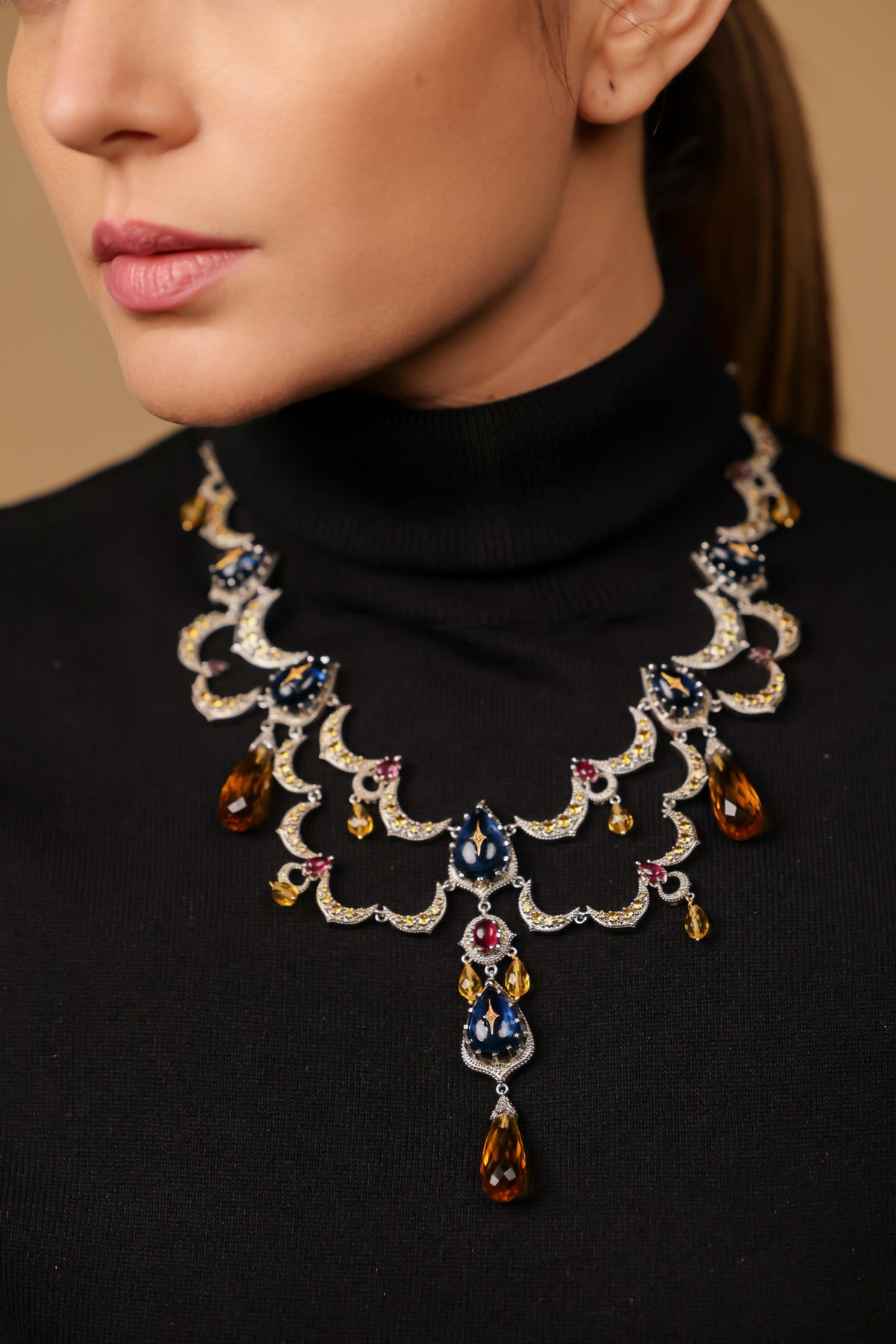 Sara Necklace worn as a standalone statement collar, styled with minimal earrings and a simple neckline