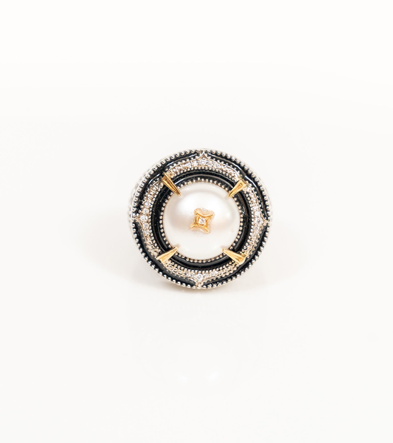 Detail of the black hand-painted enamel and vintage-inspired craftsmanship on the Shakuntala Ring