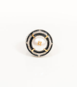 Detail of the black hand-painted enamel and vintage-inspired craftsmanship on the Shakuntala Ring