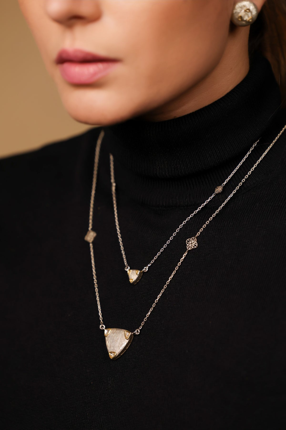 Sky Necklace worn alone for minimal chic, mixed with a longer pendant