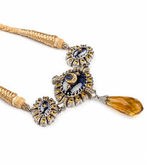 Virja Necklace with kyanite and topaz detailing in a vintage form, finishing in a crescent moon and topaz drop, with blue hand-painted enamel
