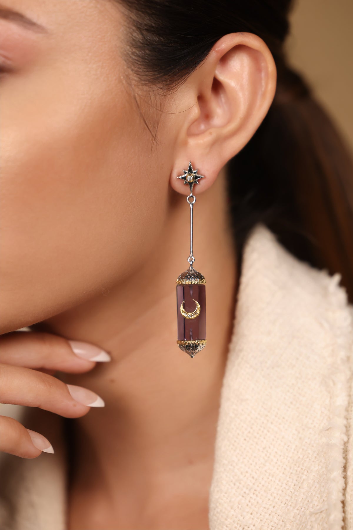 Close-up of the amethyst and Polki diamond detailing on the Zaranj Danglers