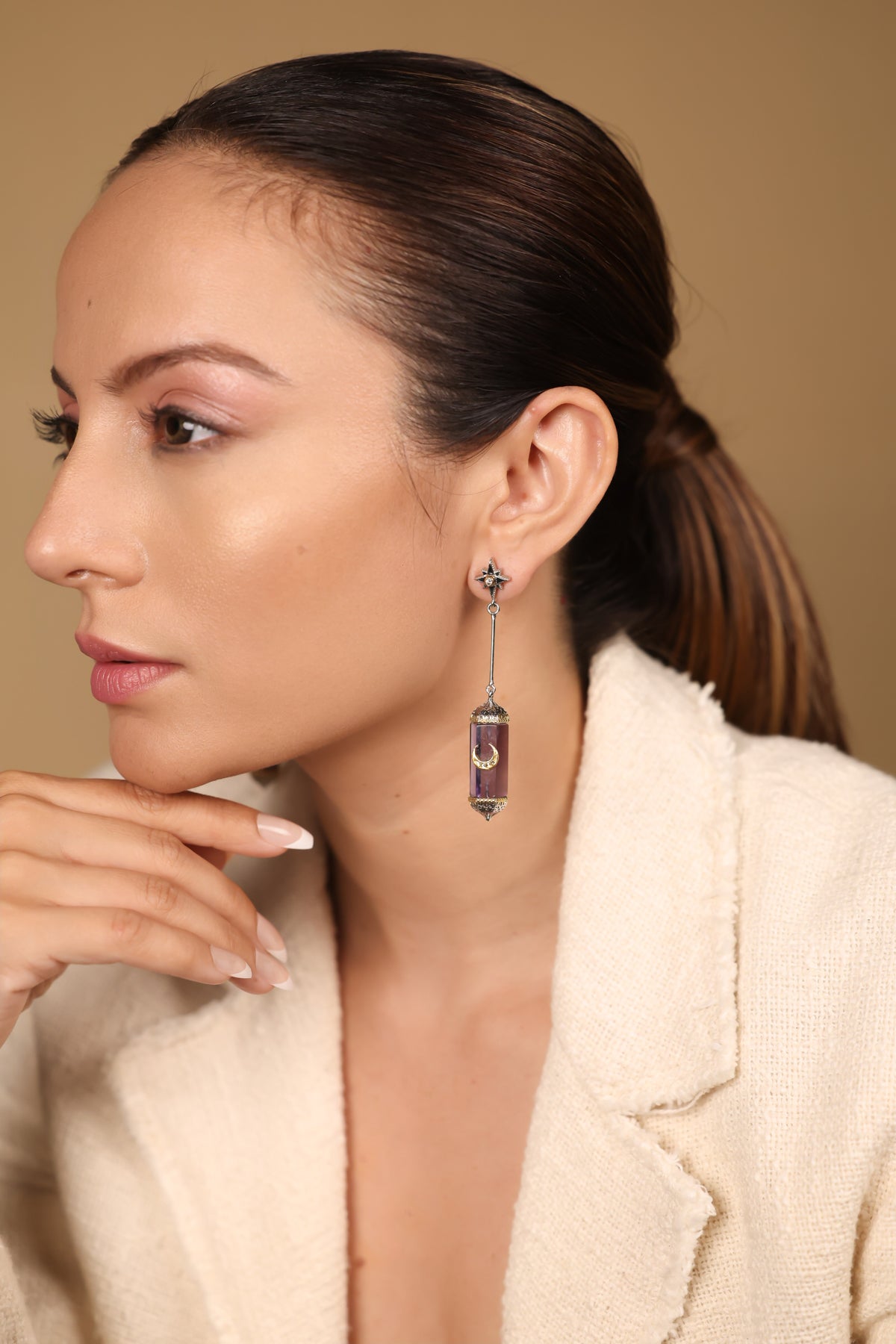 Zaranj Danglers worn with a soft updo, highlighting the amethyst's richness