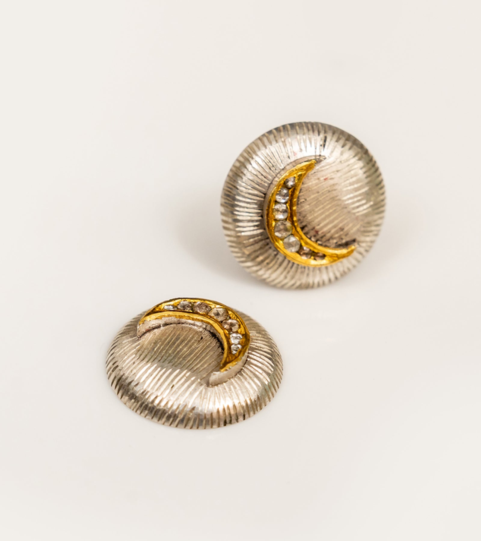 Detail of the fine gold accents and sculptural texture on the Ziv Studs