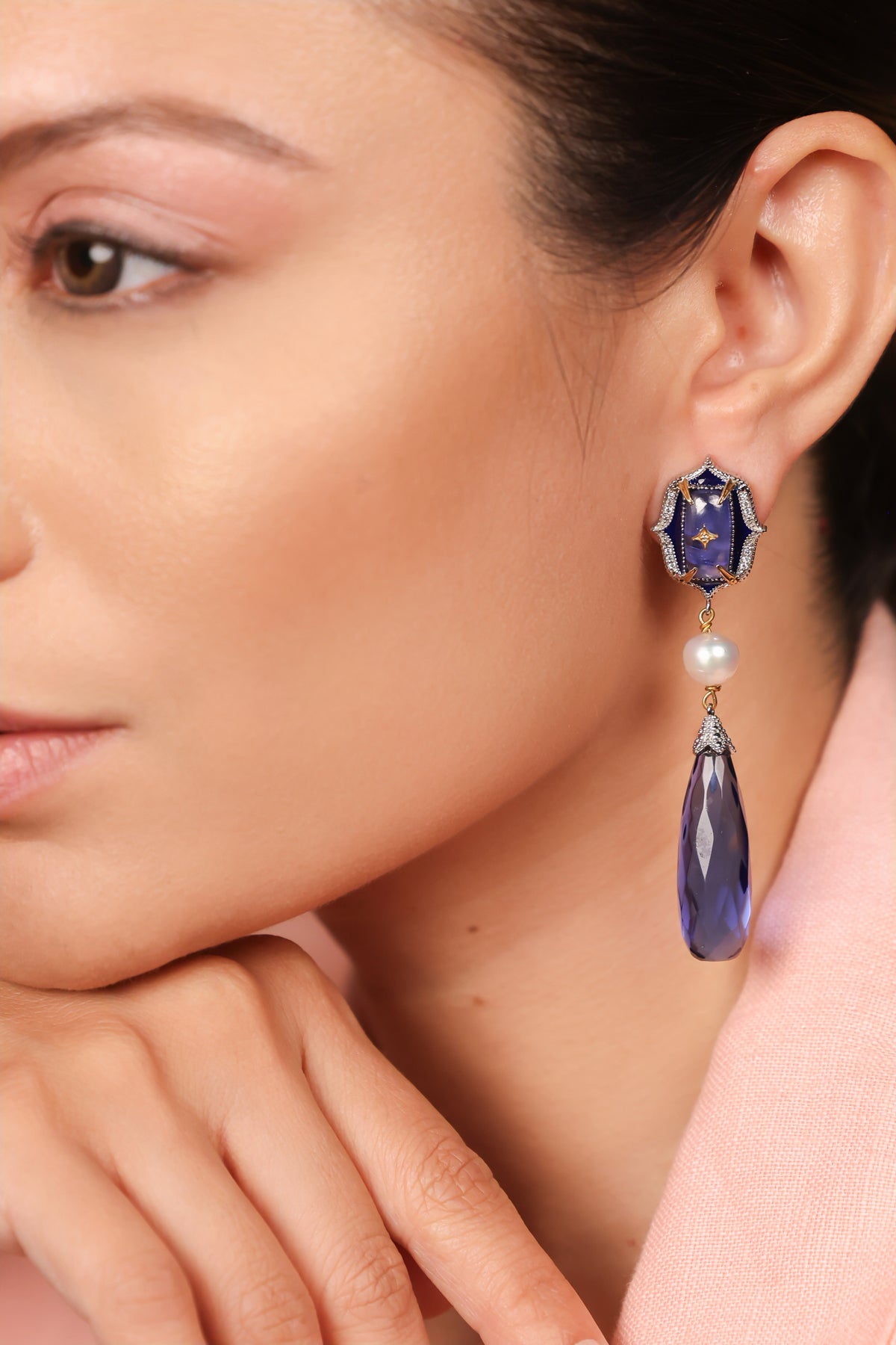 Close-up of the kyanite crystal drop and hand-painted blue enamel detailing on the Ziva Earrings