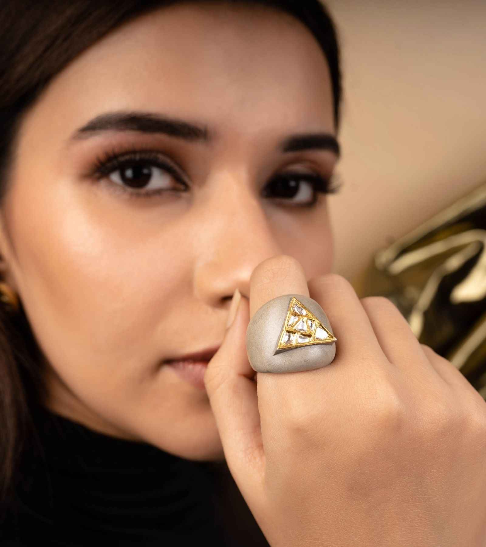 Uncut Jewelry makes Triangolo Cocktail Ring is made with Polki Diamonds